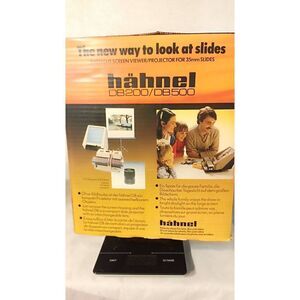 Vintage Hahnel 8200 slide projector with attachable viewing screen. In original